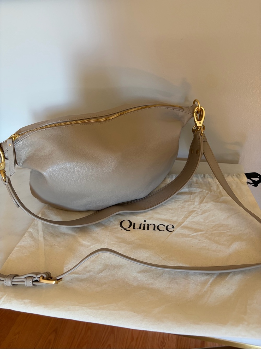 Quince Leather Convertible Crescent Bag in Light Taupe Gray with Gold Hardware